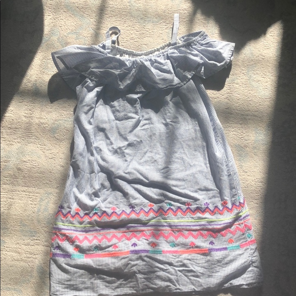 Off the shoulder dress. Blue and white stripes.